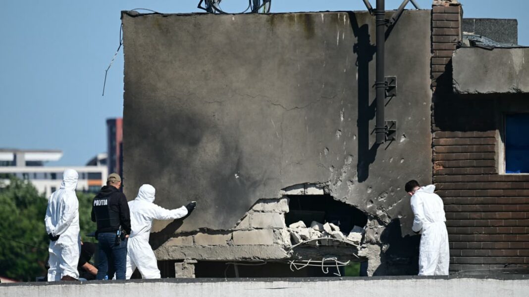 Impact of the drone strike on the apartment building in Galati