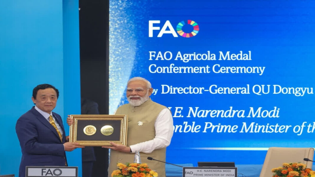 Narendra Modi receiving the Agricola Medal for 2026