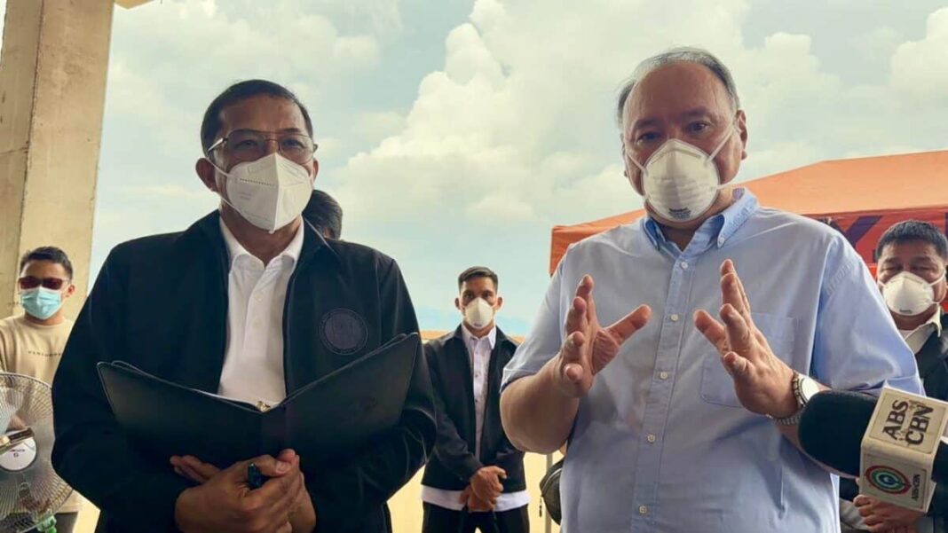 Defense Secretary Gilbert Teodoro (right)