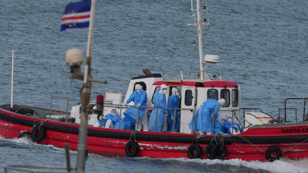 Health workers evacuating patients