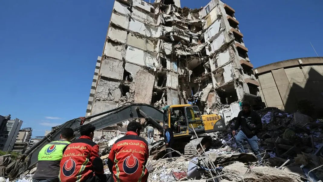 Lebanese rescue workers clear rubble at the site of an airstrike on a day of intense assaults in Beirut, Lebanon, on April 9, 2026.