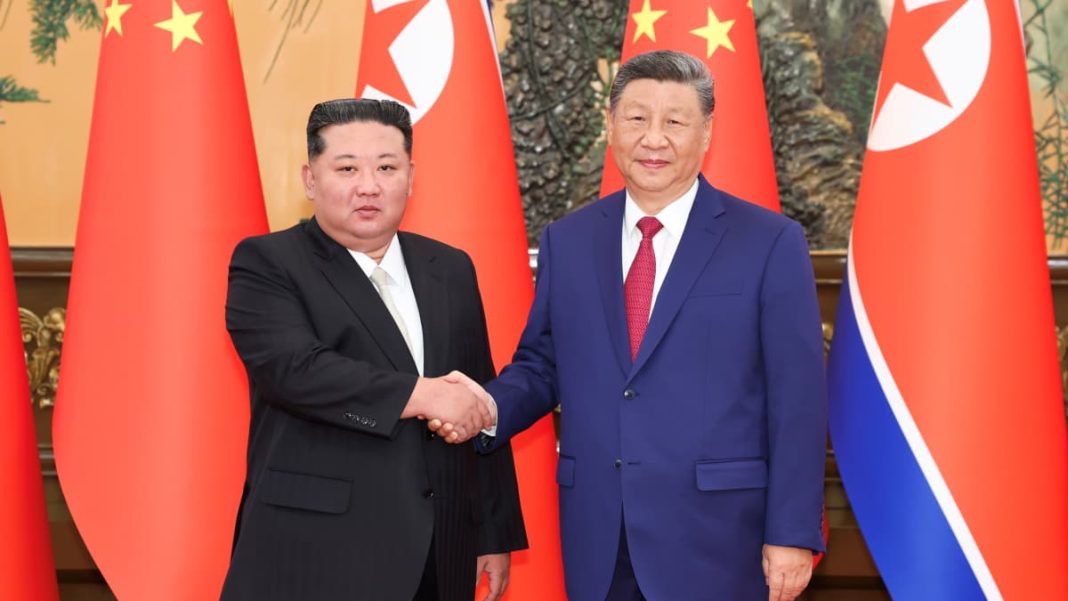 Xi Jinping and Kim Jong Un