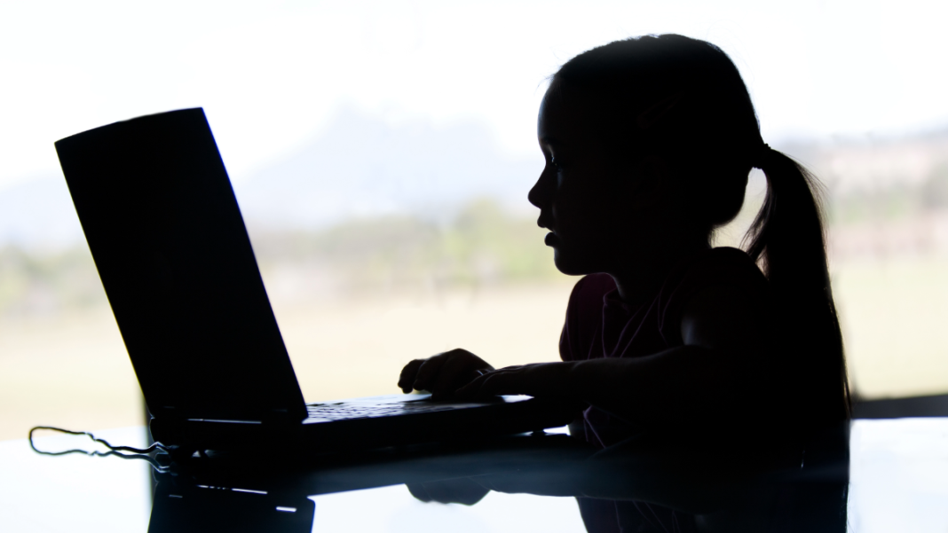 A child using a laptop
