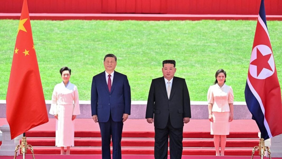 Xi Jinping and Kim Jong Un