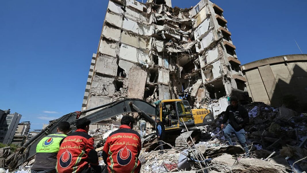 Lebanese rescue workers clear rubble at the site of an airstrike on a day of intense assaults in Beirut, Lebanon, on April 9, 2026.